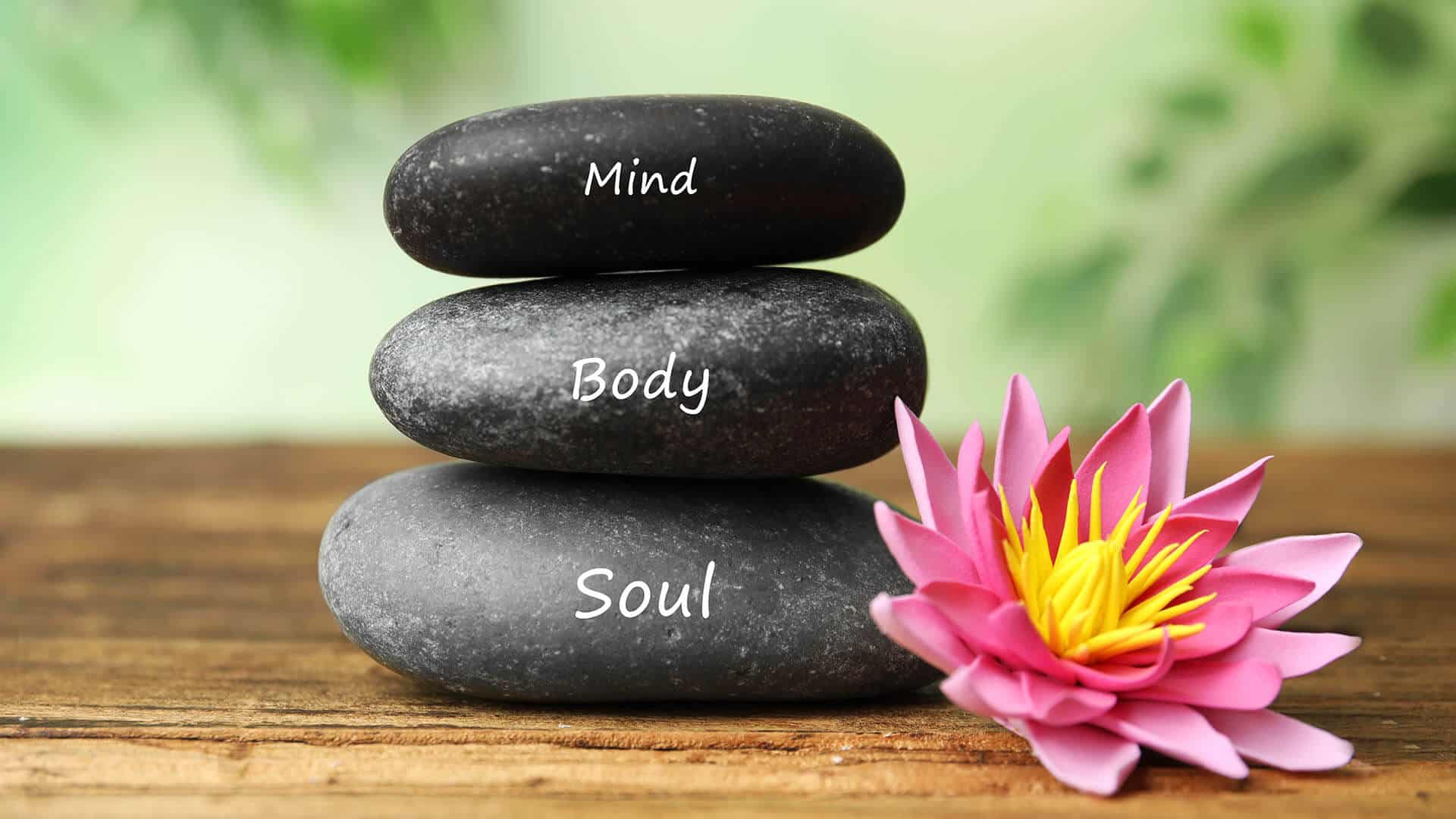 Rocks with mind, body and soul inscribed on them.